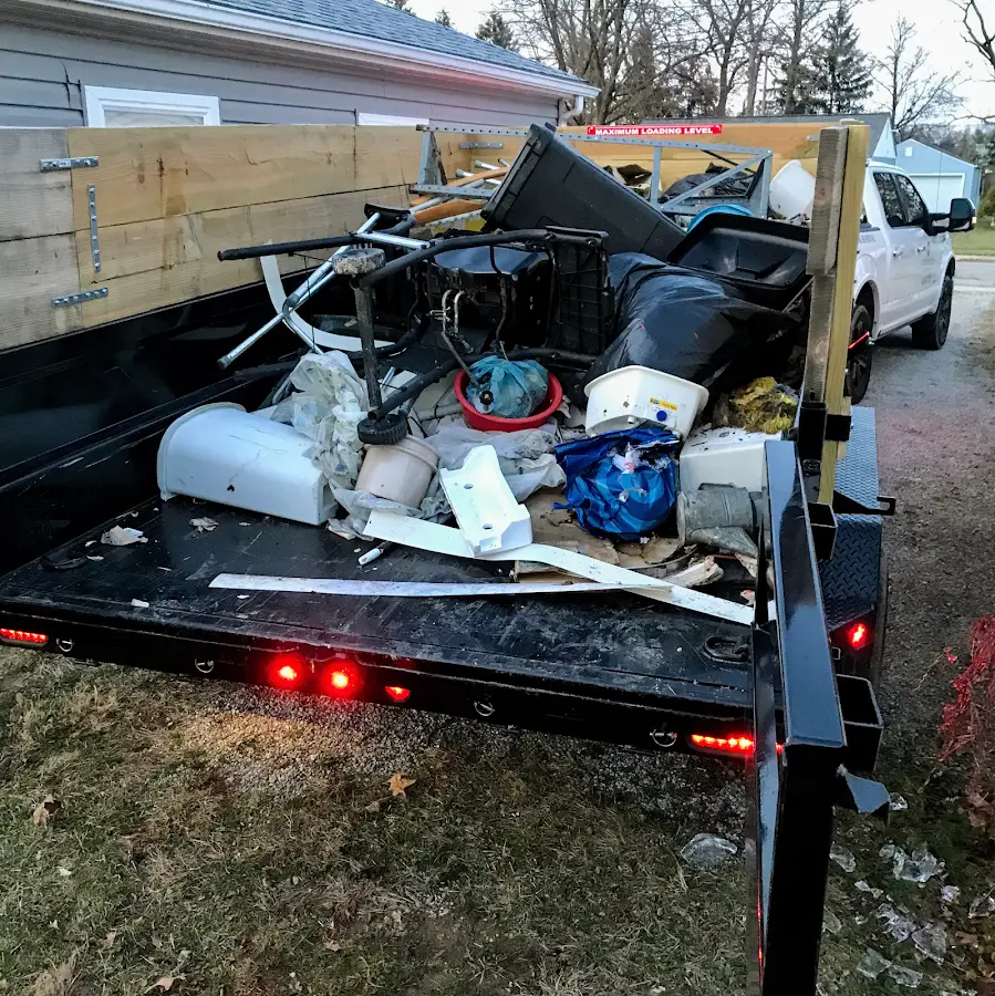 Roll-off dumpster delivered to a residential driveway in Providence